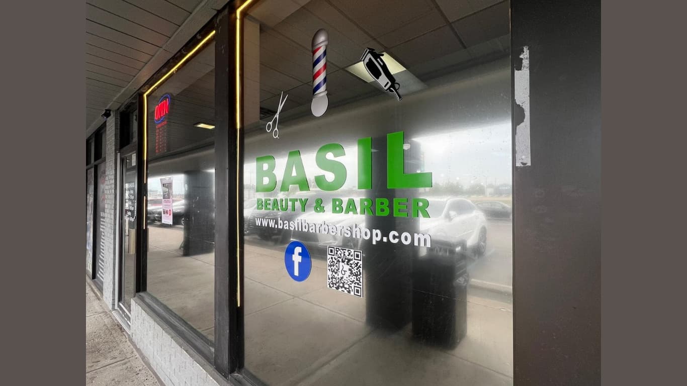 Professional barbers performing expert grooming services at Basil Beauty and Barber Shop in Indianapolis